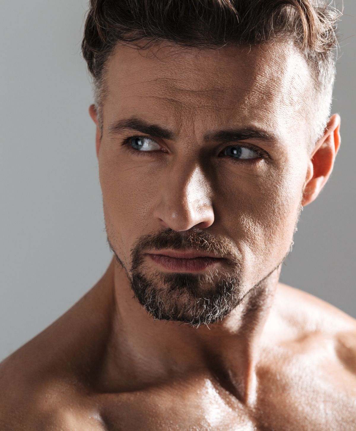 Model posing elegantly in a stylish outfit.